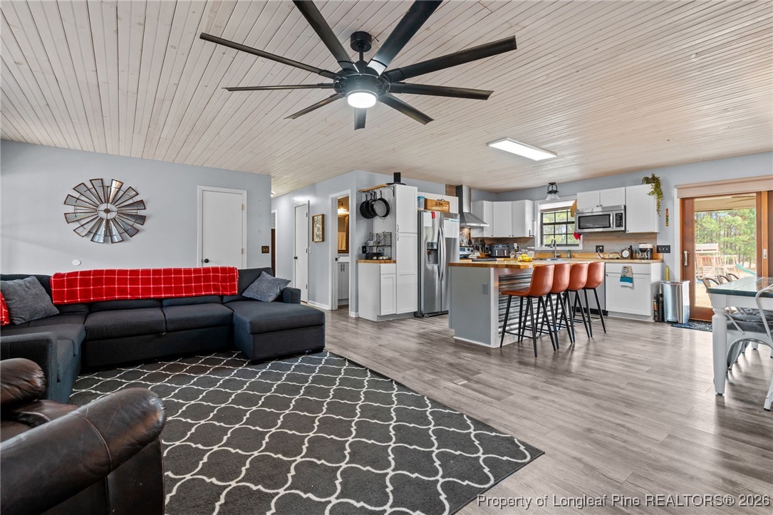 2229 Tingen Road Lillington, NC 27546 - Photo 12 of 50 a living room with furniture and a table