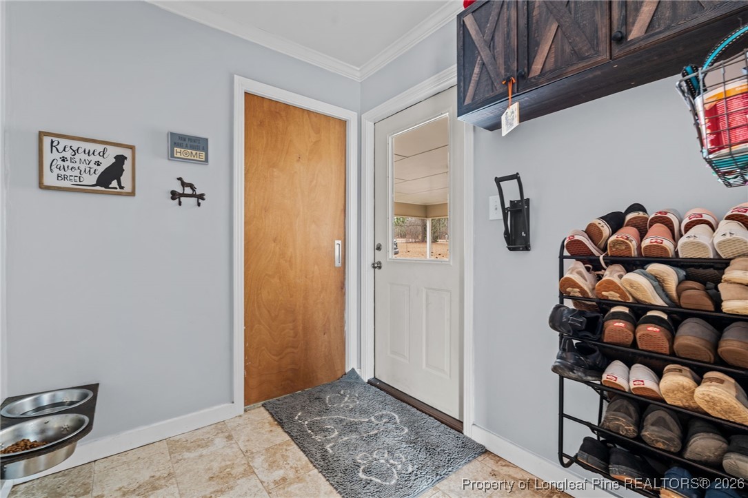 2229 Tingen Road Lillington, NC 27546 - Photo 20 of 50 a view of a room with shelves