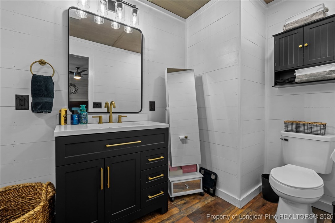 2229 Tingen Road Lillington, NC 27546 - Photo 29 of 50 a bathroom with a sink and a mirror