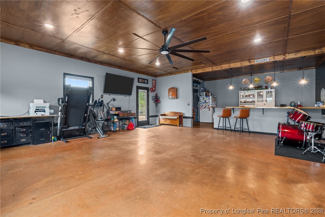 2229 Tingen Road Lillington, NC 27546 - Photo 33 of 50 a view of a room with gym equipment