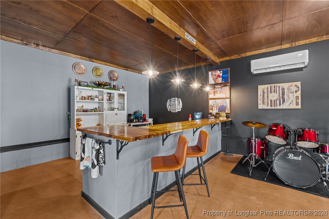 2229 Tingen Road Lillington, NC 27546 - Photo 36 of 50 a view of a room with gym equipment