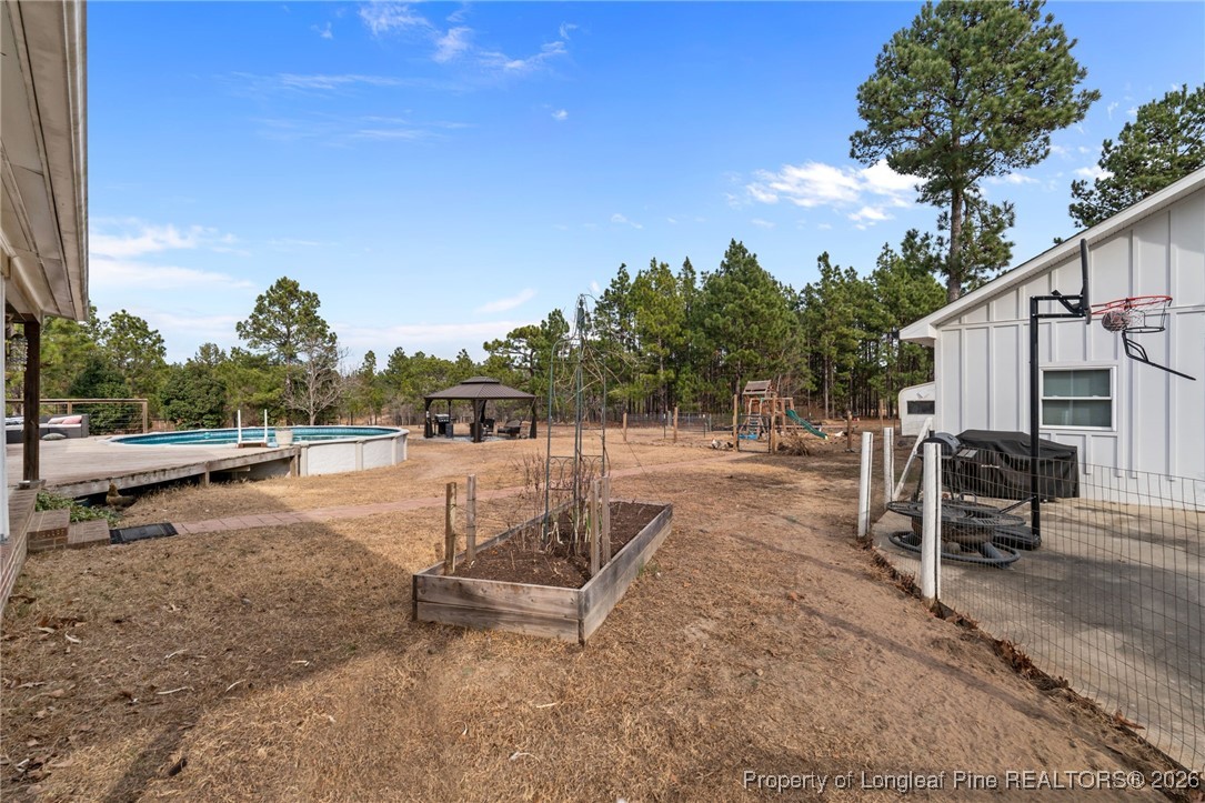 2229 Tingen Road Lillington, NC 27546 - Photo 45 of 50 a view of outdoor space with seating