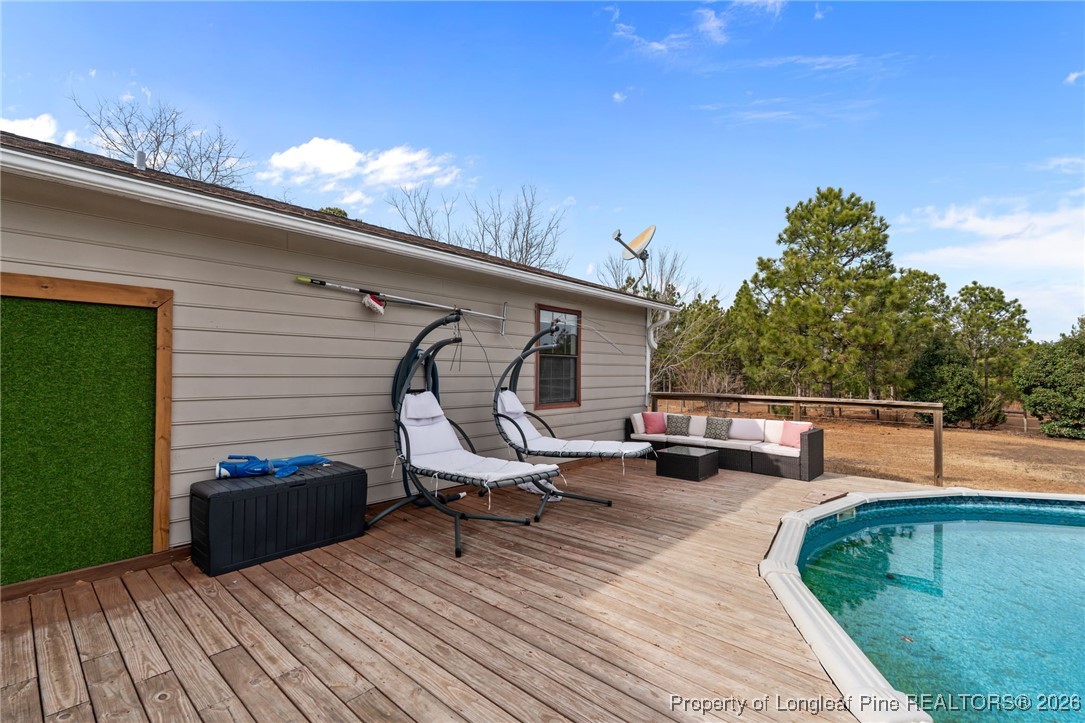 2229 Tingen Road Lillington, NC 27546 - Photo 47 of 50 a view of a terrace with sitting area