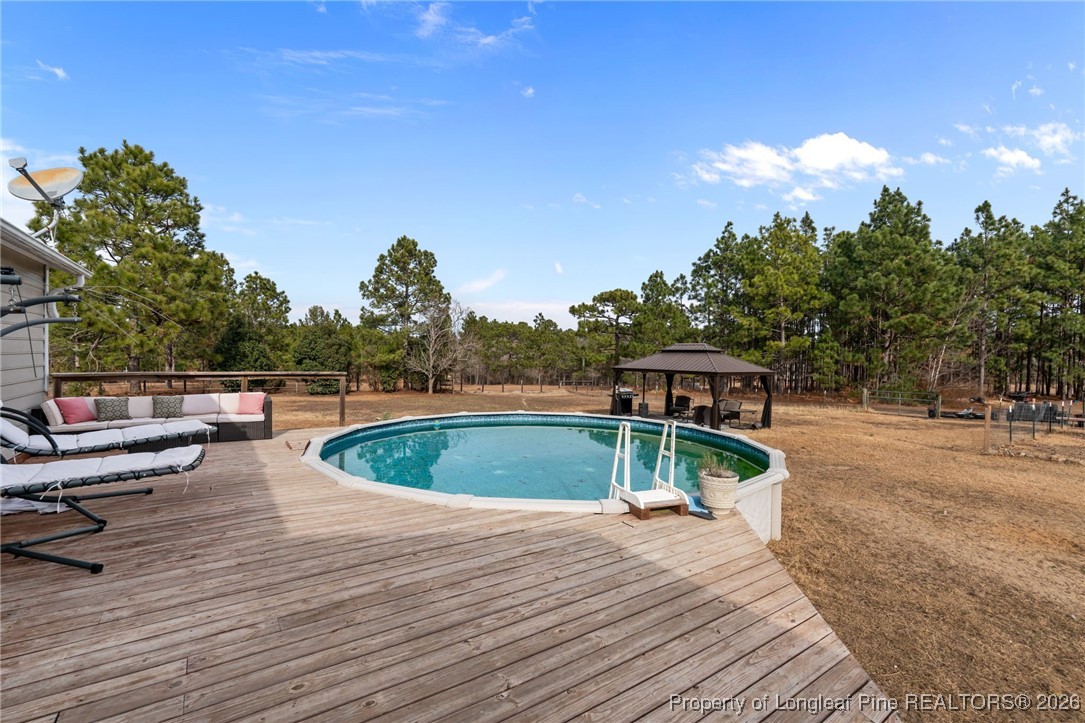 2229 Tingen Road Lillington, NC 27546 - Photo 48 of 50 a house view with a outdoor space