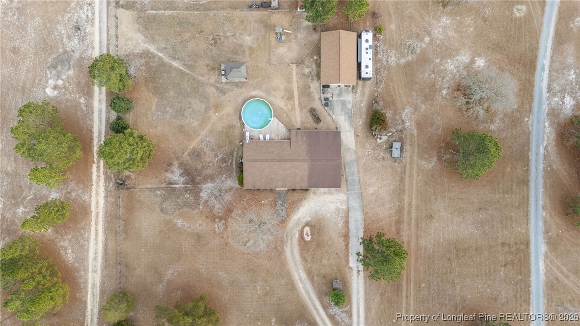 2229 Tingen Road Lillington, NC 27546 - Photo 7 of 50 an aerial view of a house with a garden
