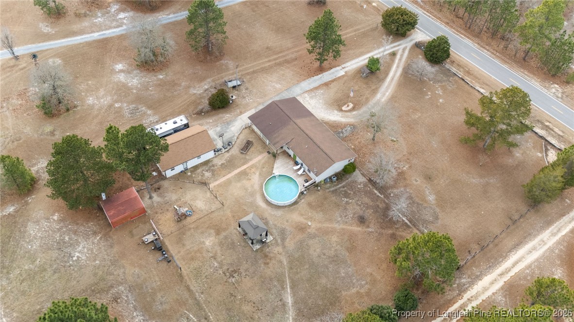 2229 Tingen Road Lillington, NC 27546 - Photo 9 of 50 an aerial view of a house with outdoor space