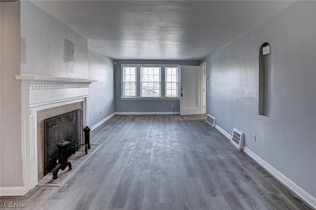 3423 Westbury Road Cleveland, OH 44120 - Photo 32 of 38 Unfurnished living room featuring hardwood / wood-style floors