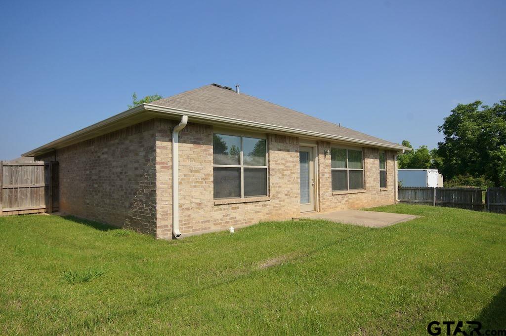 623 Hagan Road Whitehouse, TX 75791 - Photo 27 of 28 a front view of a house with a garden