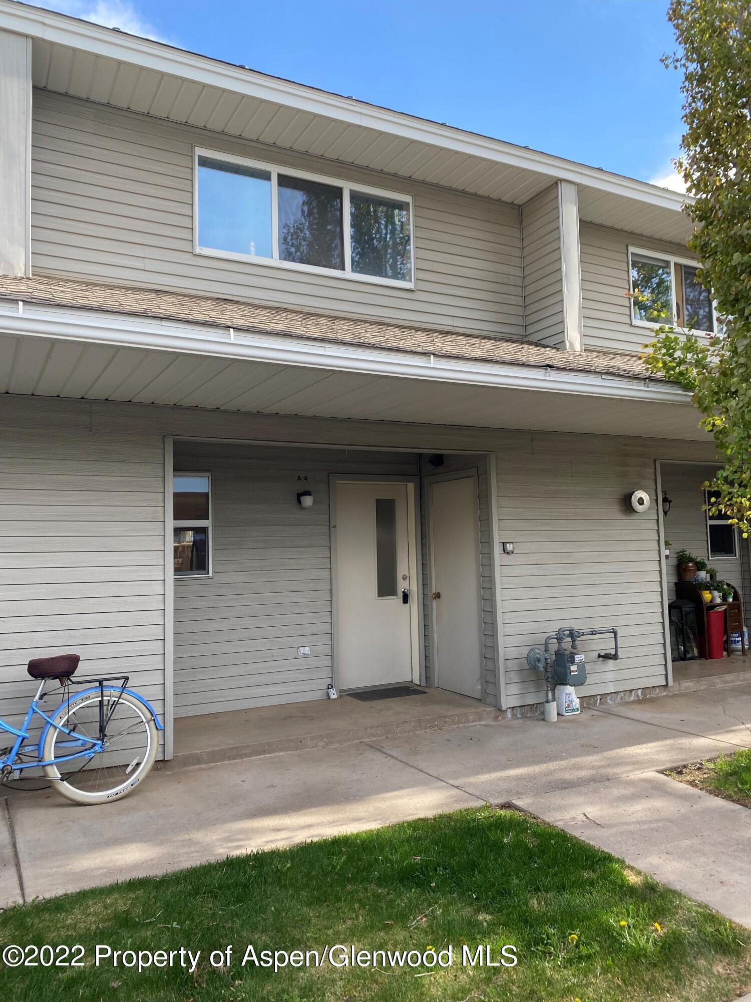 405 Park Avenue, Unit A4 Basalt, CO 81621 - Photo 1 of 1 a view of a house with a patio