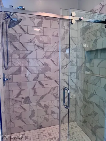 a view of storage and utility room with empty racks