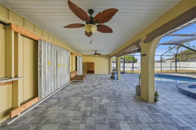 a view of a backyard with furniture