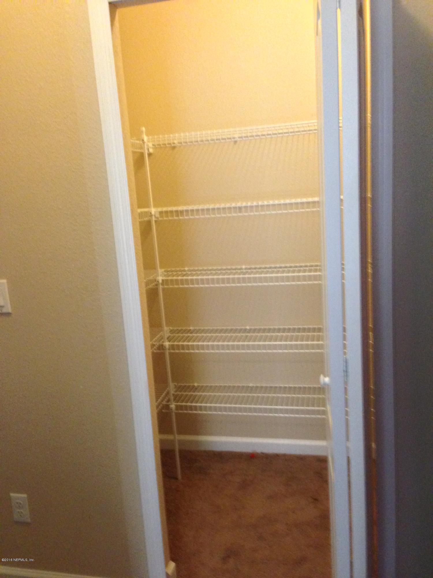 16306 Tisons Bluff Road Jacksonville, FL 32218 - Photo 18 of 35 Walk-in storage with shelving