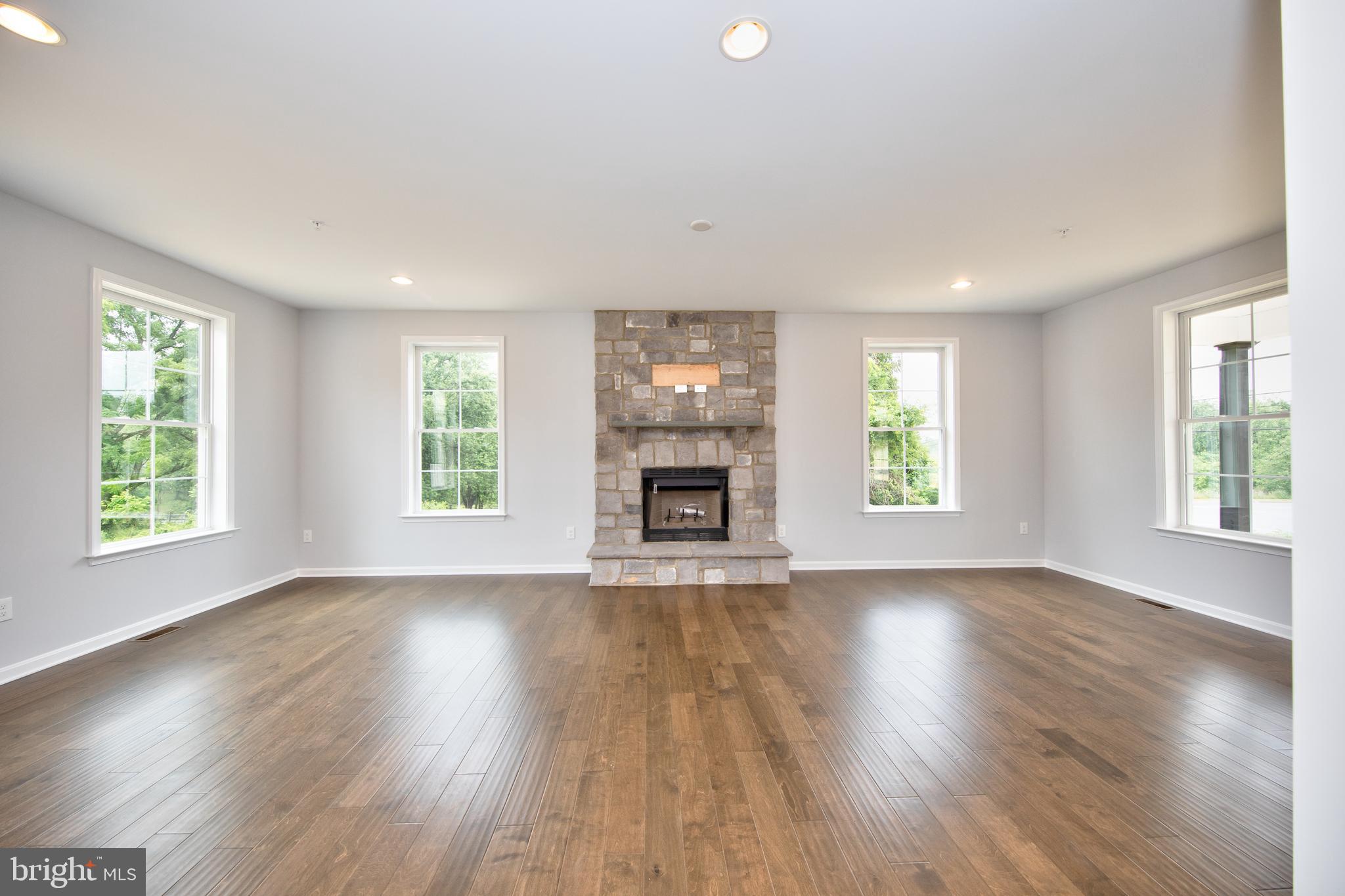 3118 Charles Street Fallston, MD 21047 - Photo 5 of 48 Family room w/stone hearth gas fireplace