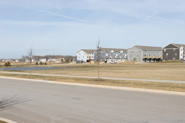 a spacious bathroom with a tub and a sink