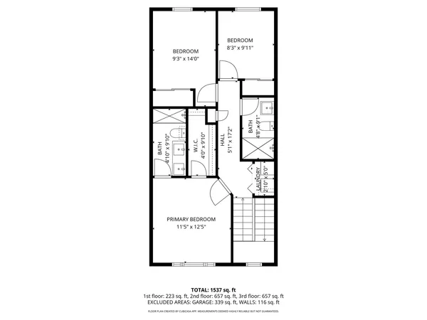 a picture of a bench in front of a wall