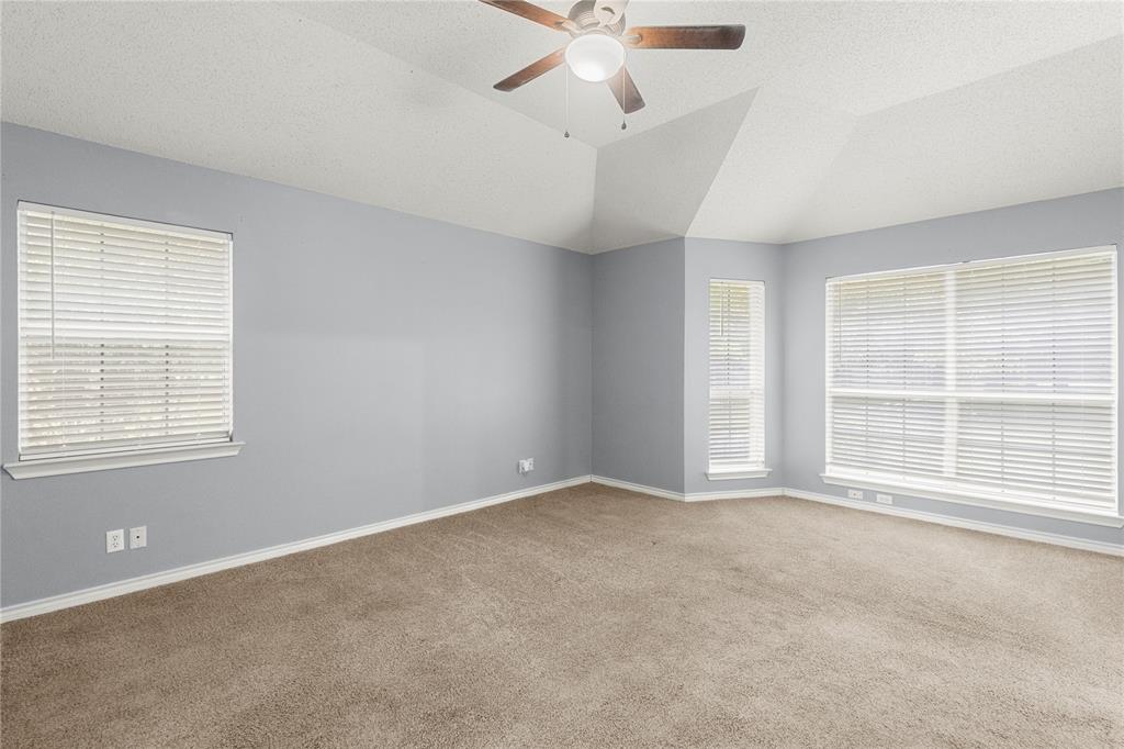 2917 Harlow Road Commerce, TX 75428 - Photo 16 of 40 a view of an empty room with a window