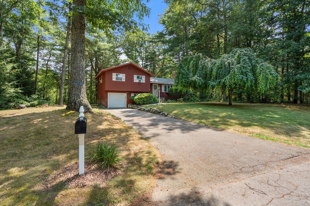 25 Meadowbrook Road Sudbury, MA 01776 - Photo 3 of 41 a front view of a house with a yard