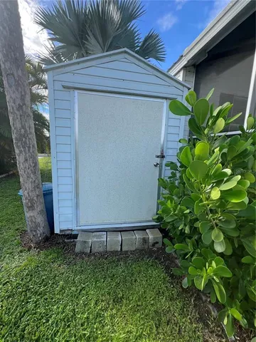 a house with a tree in front of it