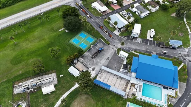 an aerial view of a house with a garden