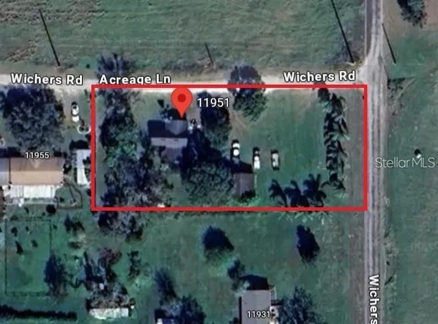 an aerial view of houses and roads