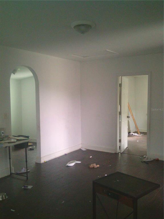 11951 Wichers Road San Antonio, FL 33576 - Photo 25 of 41 an empty room with a bench