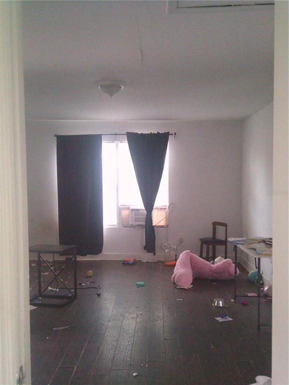 11951 Wichers Road San Antonio, FL 33576 - Photo 27 of 41 a bathroom with a sink mirror and window