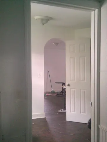 a view of a dining room with furniture and a table