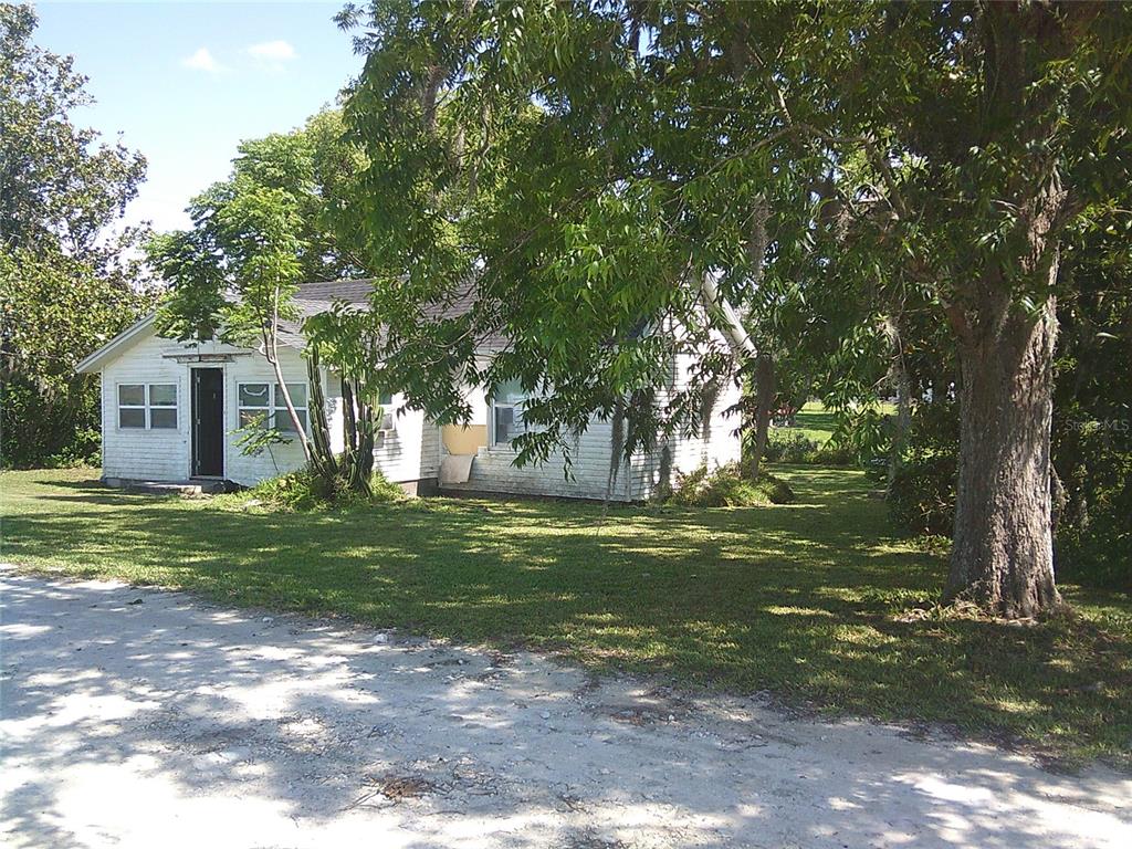 11951 Wichers Road San Antonio, FL 33576 - Photo 7 of 41 a view of a house with a yard