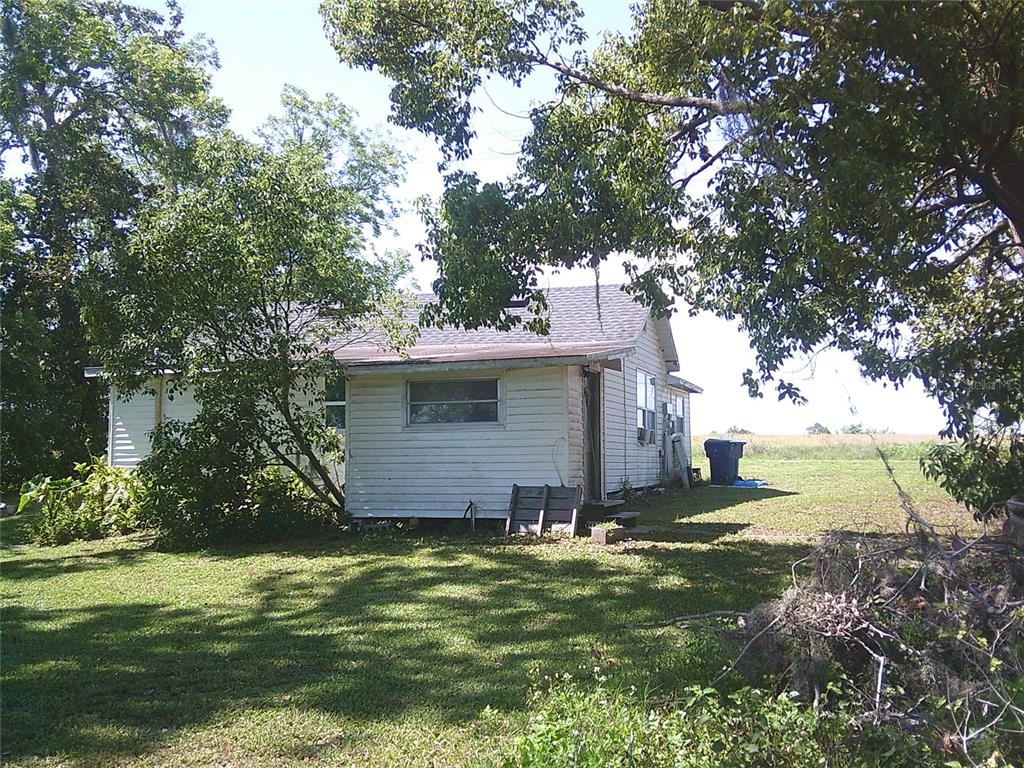 11951 Wichers Road San Antonio, FL 33576 - Photo 10 of 41 a view of a house with a yard