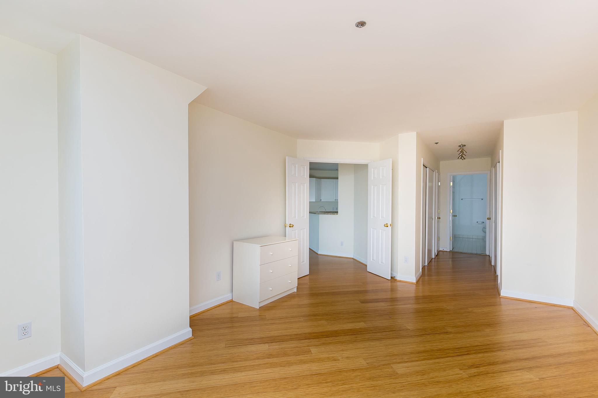 100 Harborview Drive, Unit 513 Baltimore, MD 21230 - Photo 16 of 58 a view of a room with wooden floor