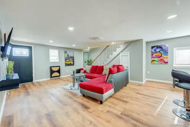 a bedroom with furniture and a bed