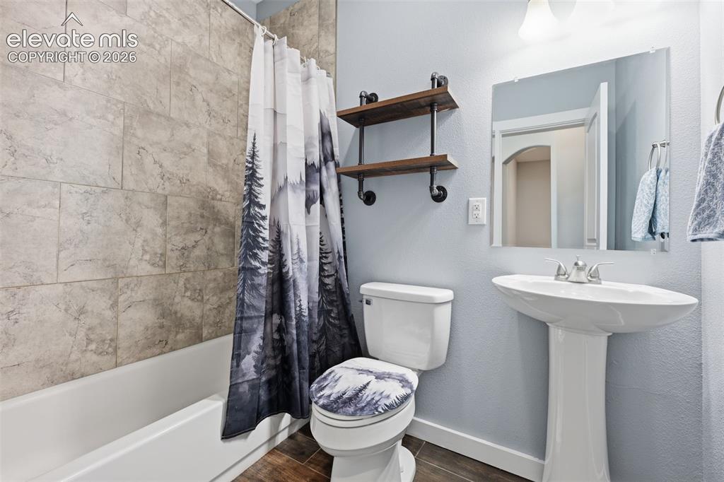 23335 Sanborn Road Calhan, CO 80808 - Photo 22 of 28 Basement bathroom with updated finishes