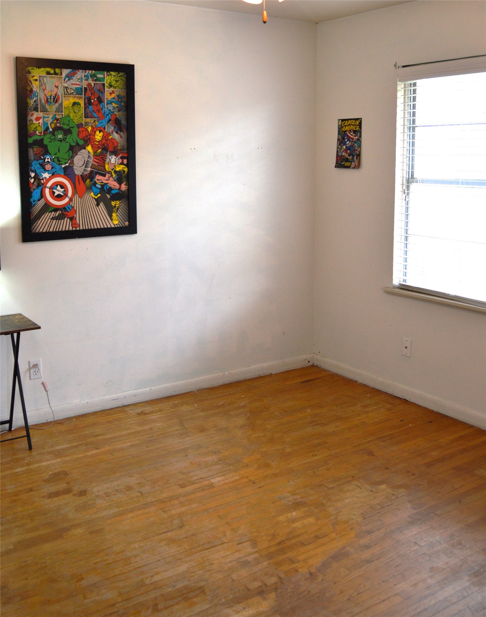 1105 Earley Street Sweeny, TX 77480 - Photo 3 of 12 a view of room with window and wooden floor