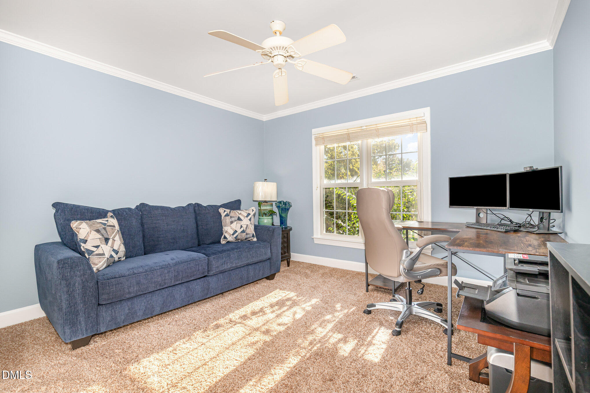 8700 Aldersgate Way Raleigh, NC 27615 - Photo 26 of 34 a living room with furniture and a flat screen tv