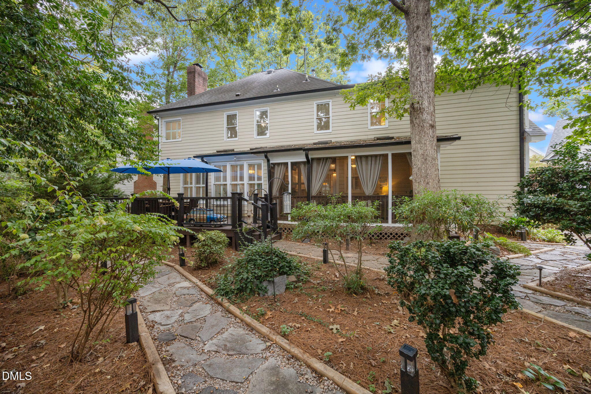8700 Aldersgate Way Raleigh, NC 27615 - Photo 29 of 34 a front view of a house with garden