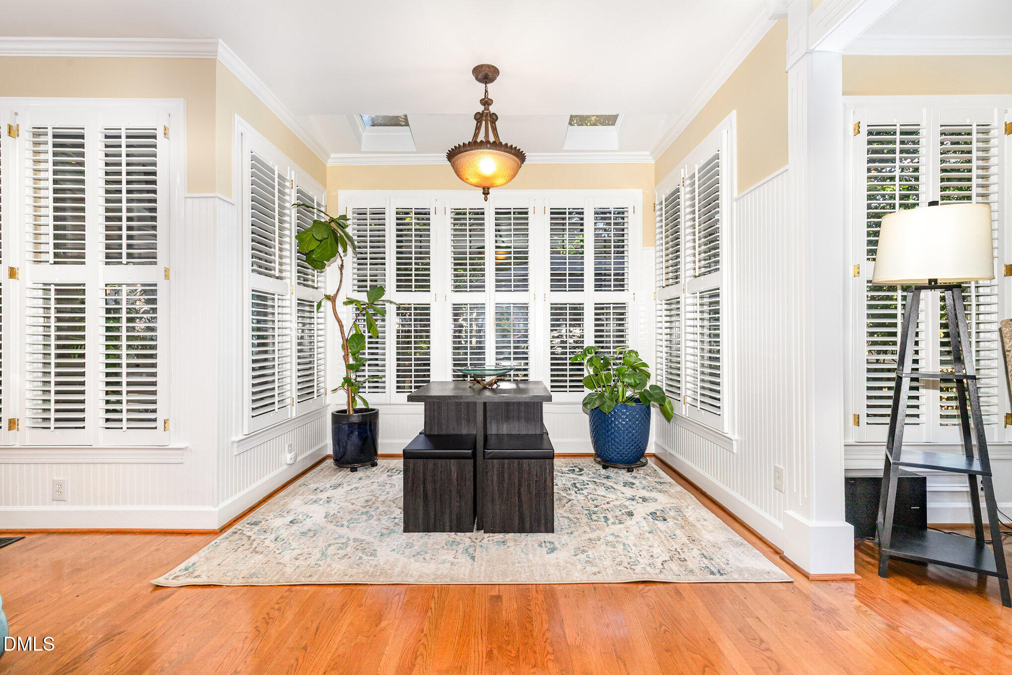 8700 Aldersgate Way Raleigh, NC 27615 - Photo 10 of 34 a view of living room with furniture and floor to ceiling windows