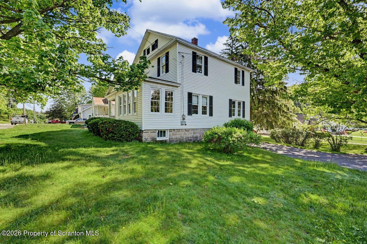 502 Layton Road Clarks Summit, PA 18411 - Photo 5 of 42 a house view with a garden space