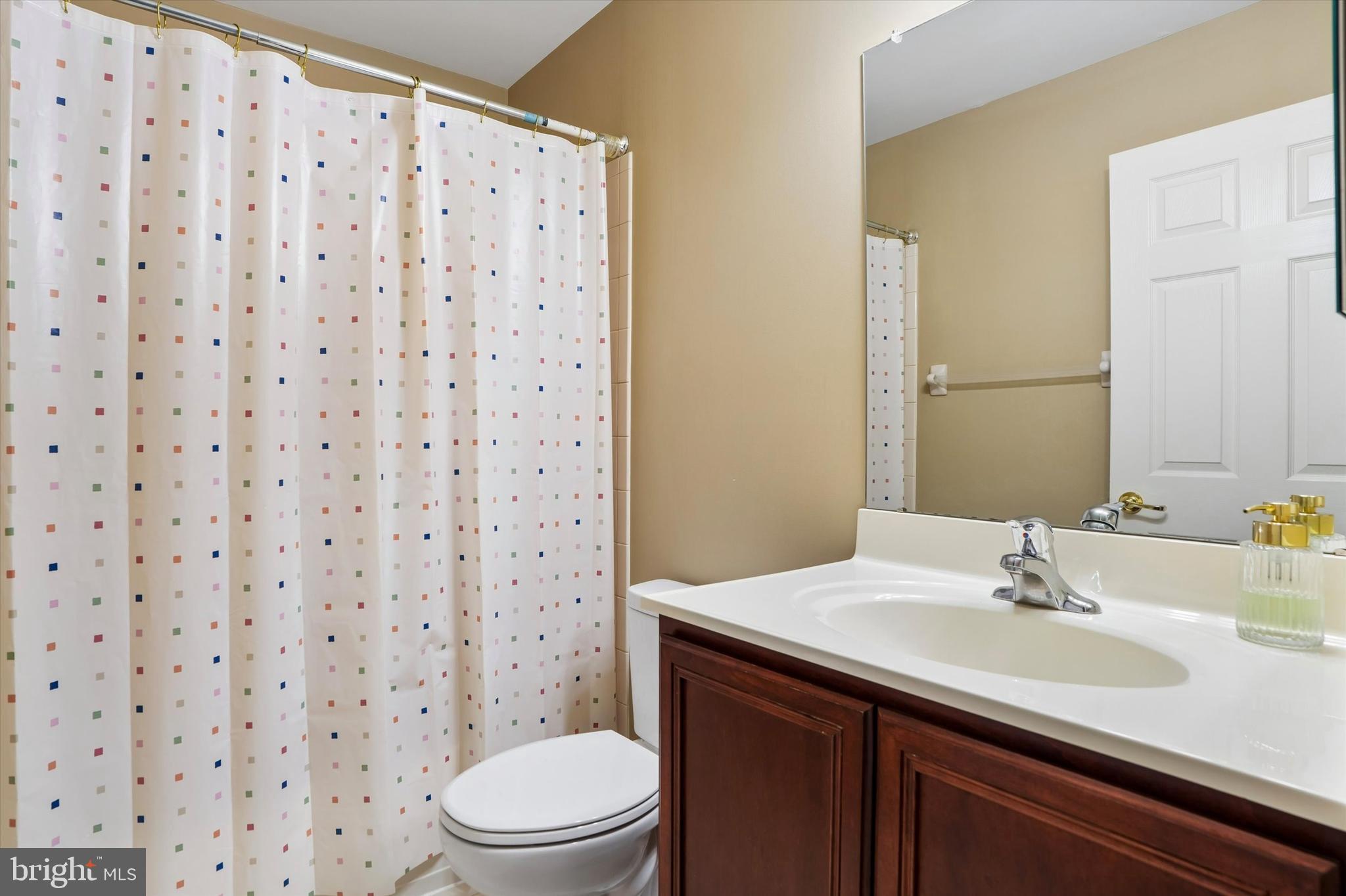 215 Flagstone Road, Unit 1 Chester Springs, PA 19425 - Photo 18 of 33 a bathroom with a sink toilet and shower