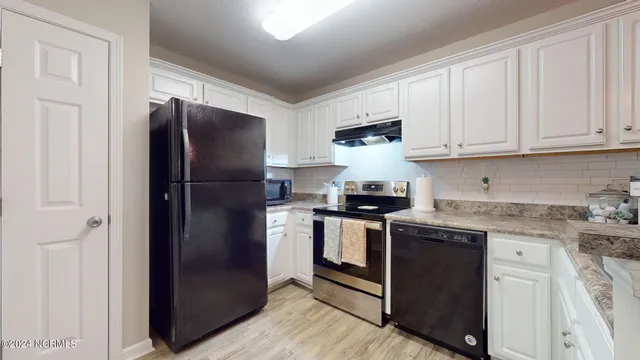 $325,000 | 625 Spencer-Farlow Drive, Unit 11, Carolina Beach, NC 28428