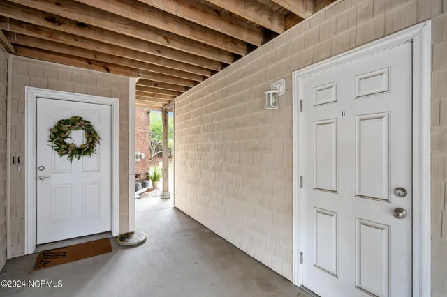 $325,000 | 625 Spencer-Farlow Drive, Unit 11, Carolina Beach, NC 28428