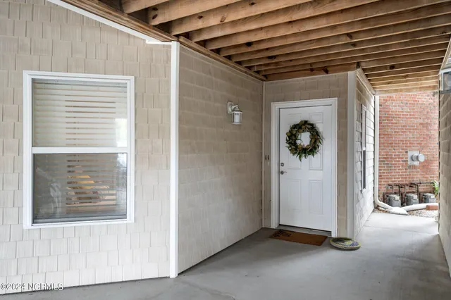 $325,000 | 625 Spencer-Farlow Drive, Unit 11, Carolina Beach, NC 28428