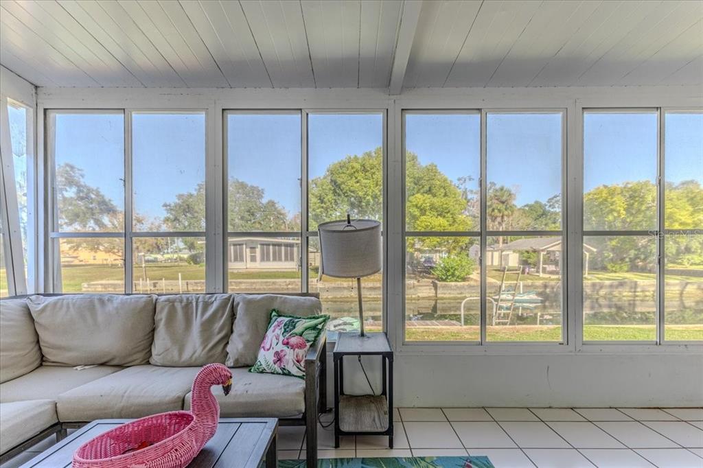 5261 Circle Drive Weeki Wachee, FL 34607 - Photo 42 of 49 a living room with furniture and a large window