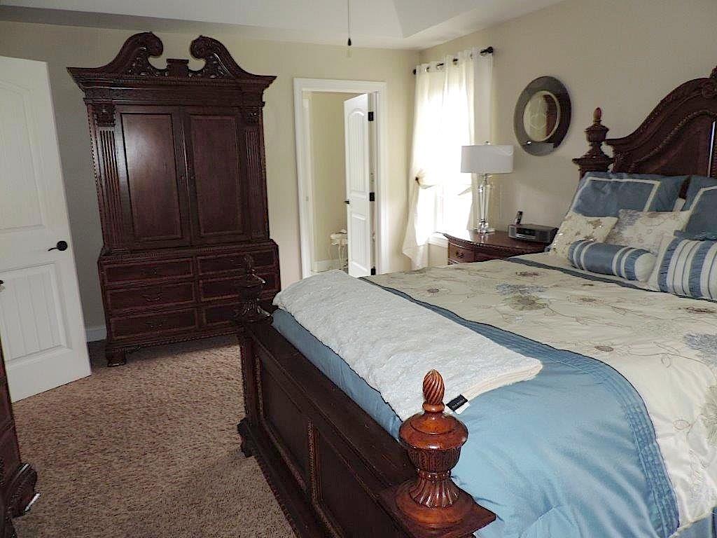 1145 Mohawk Road McDonald, PA 15057 - Photo 16 of 24 1145 Mohawk Road Grand Master Suite - Neutral wall tone, neutral carpeting, window