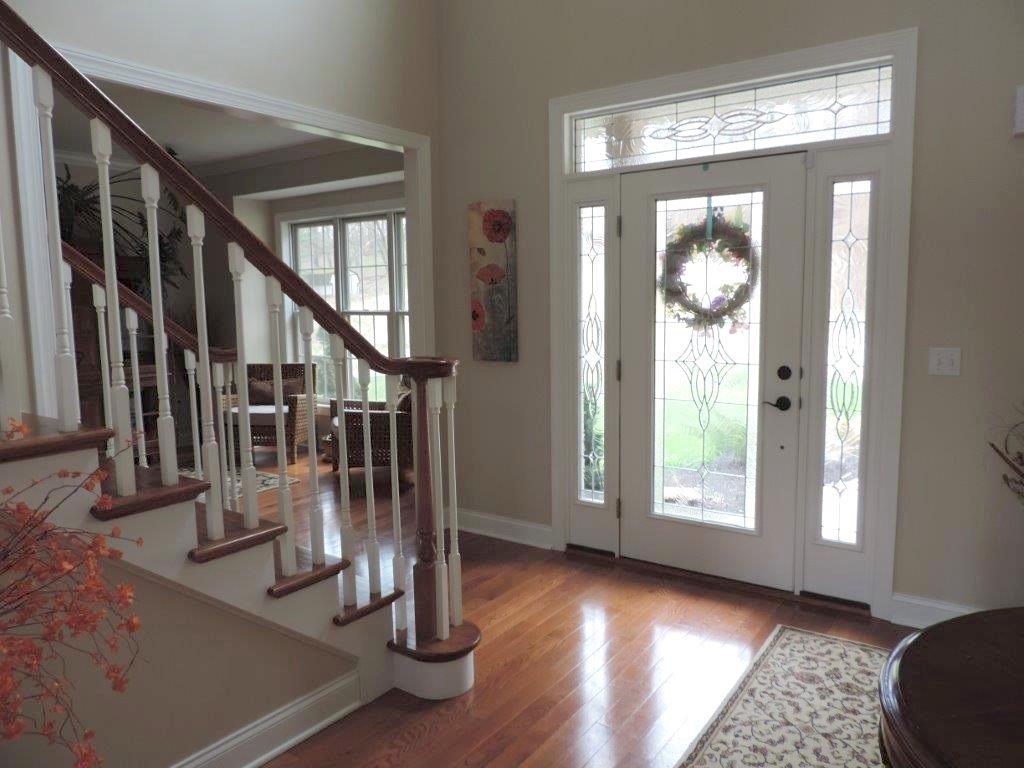 1145 Mohawk Road McDonald, PA 15057 - Photo 3 of 24 1145 Mohawk Rd. Open 2 Story Foyer - Neutral wall tone, polished hardwood flooring, custom windows on door, large window, custom chandelier