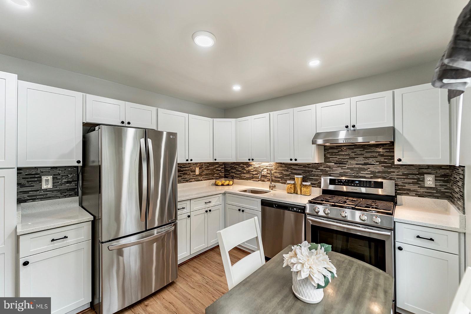 2410 Alsop Court Reston, VA 20191 - Photo 3 of 23 Kitchen with stainless steel appliances