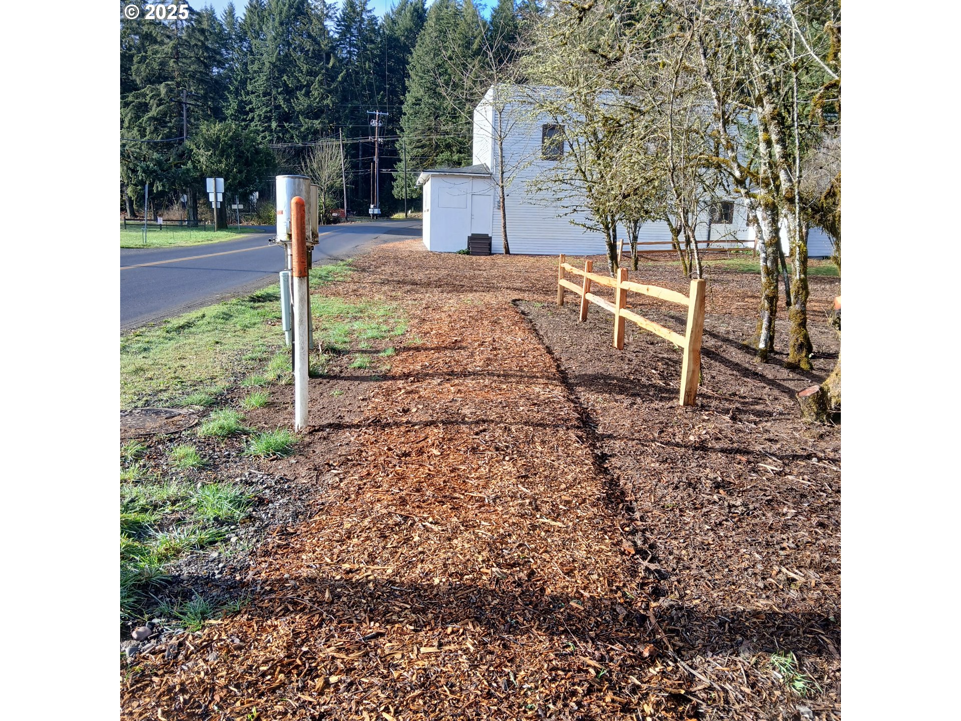 20055 Northwest Pihl Road Banks, OR 97106 - Photo 13 of 26 a backyard of a house with lots of green space