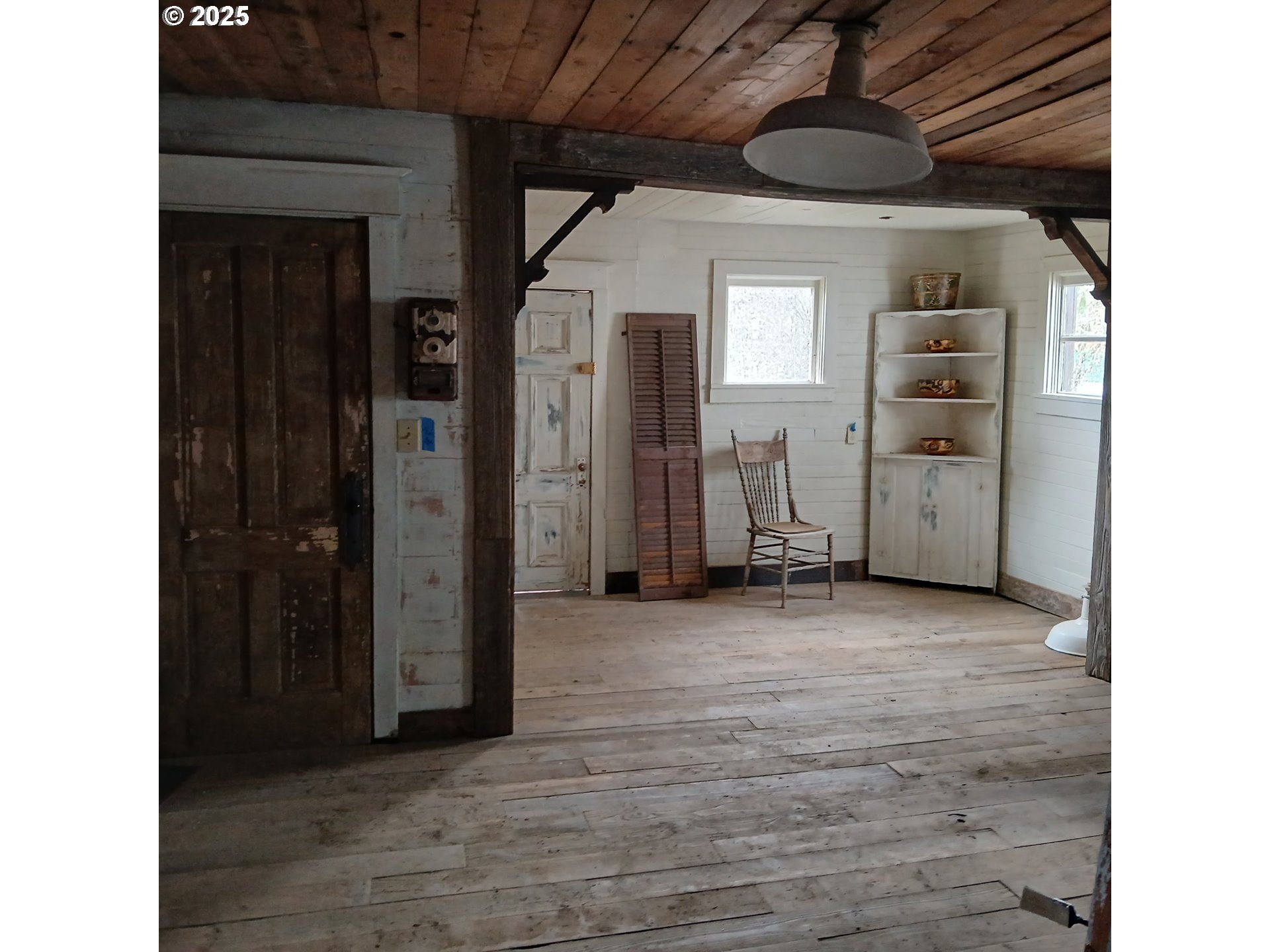 20055 Northwest Pihl Road Banks, OR 97106 - Photo 16 of 26 a view of a hallway with wooden floor