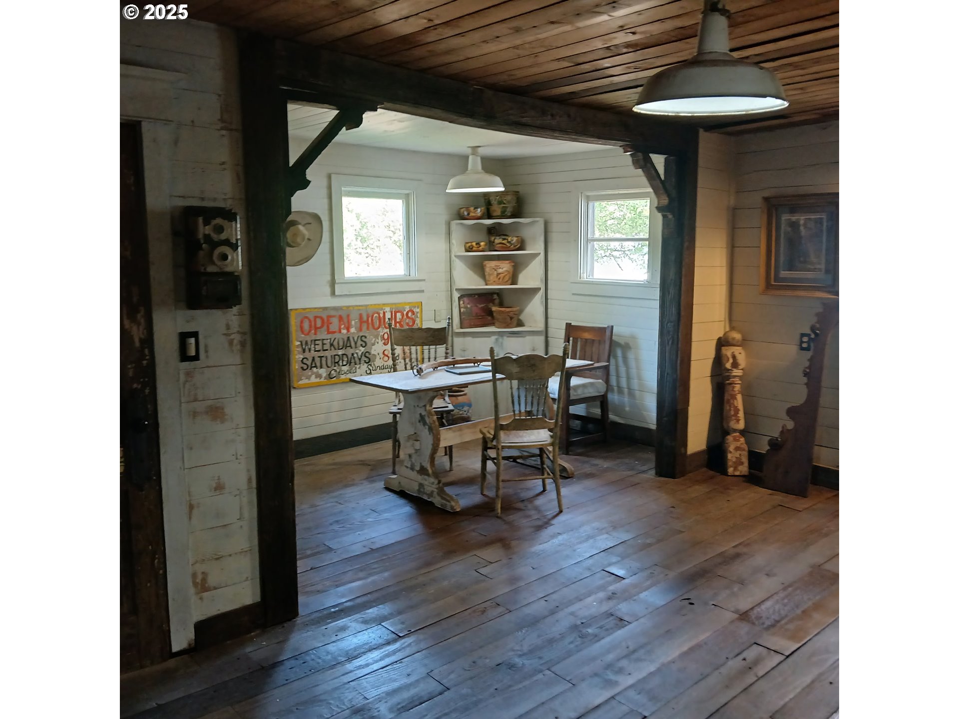 20055 Northwest Pihl Road Banks, OR 97106 - Photo 17 of 26 a living room with furniture and a wooden floor