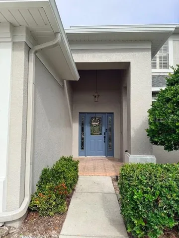a front view of a house with a porch