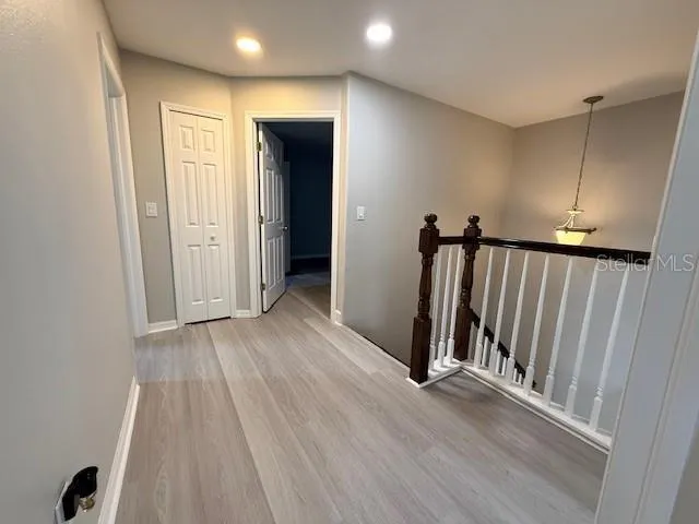 a view of hallway with stairs